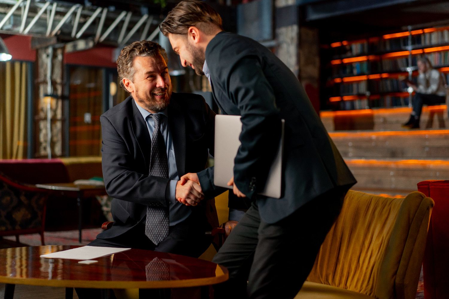 Navigating the Future: Industry Insights for Sustainable Growth 1 in the office the director sits on yellow chair an 7N78MKT